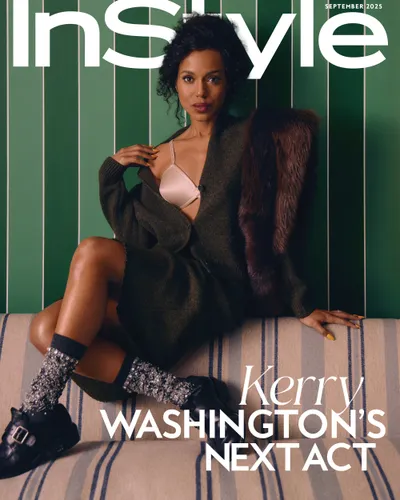 Kerry Washington posing for a magazine cover seated on a striped sofa styled with a green outfit and socks with sandals